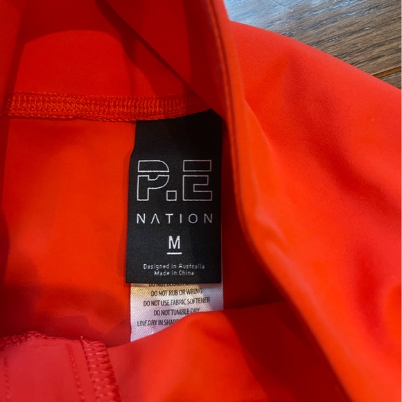 Bright red PE Nation zip front leggings size 6 - Picture 4 of 4